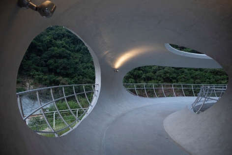 resting loop with views a creekside pavilion among hills by hcch studio