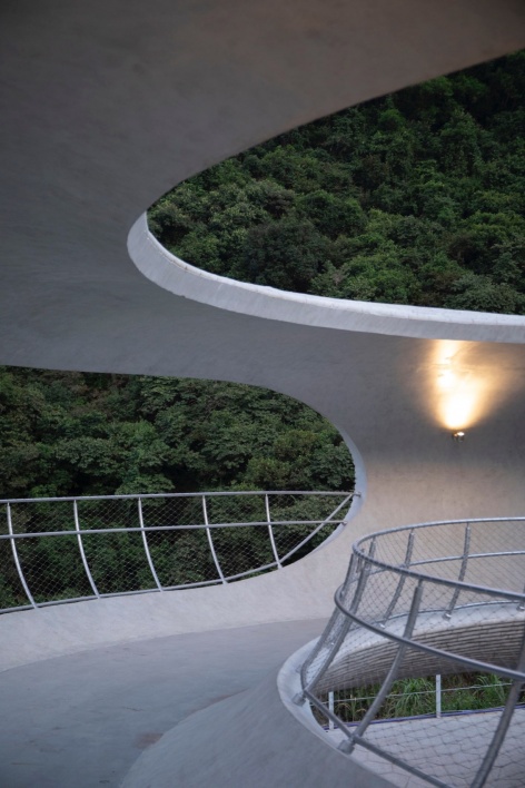 resting loop with views a creekside pavilion among hills by hcch studio