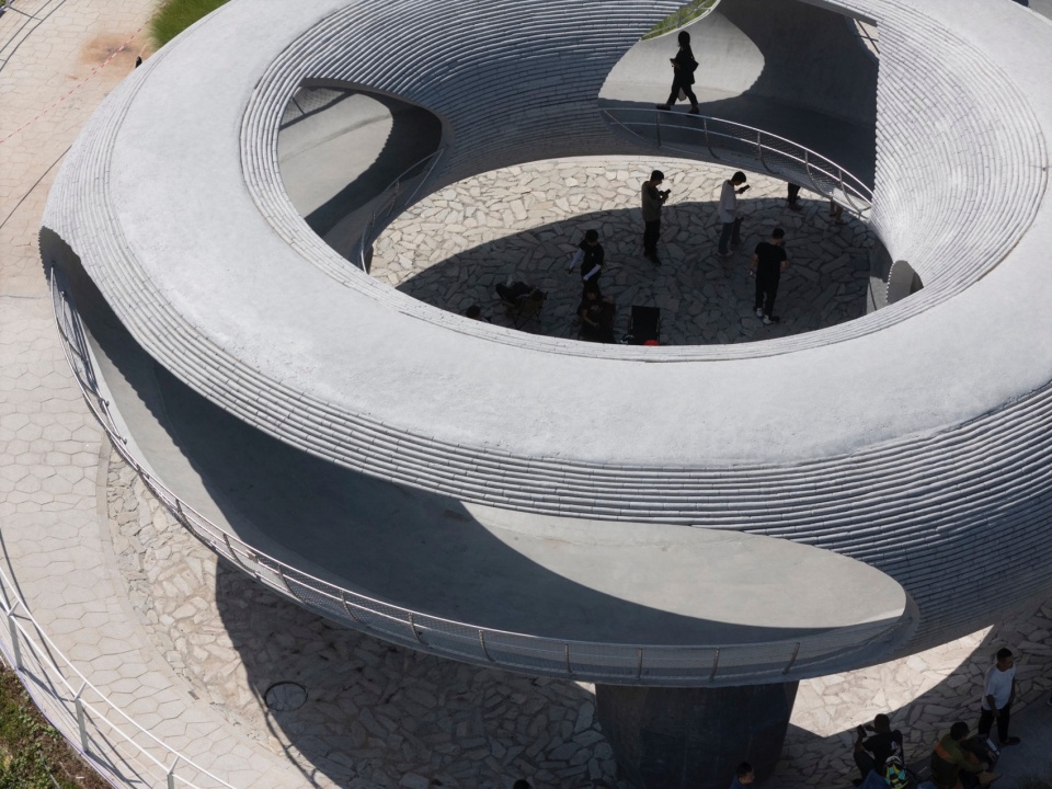 resting loop with views a creekside pavilion among hills by hcch studio