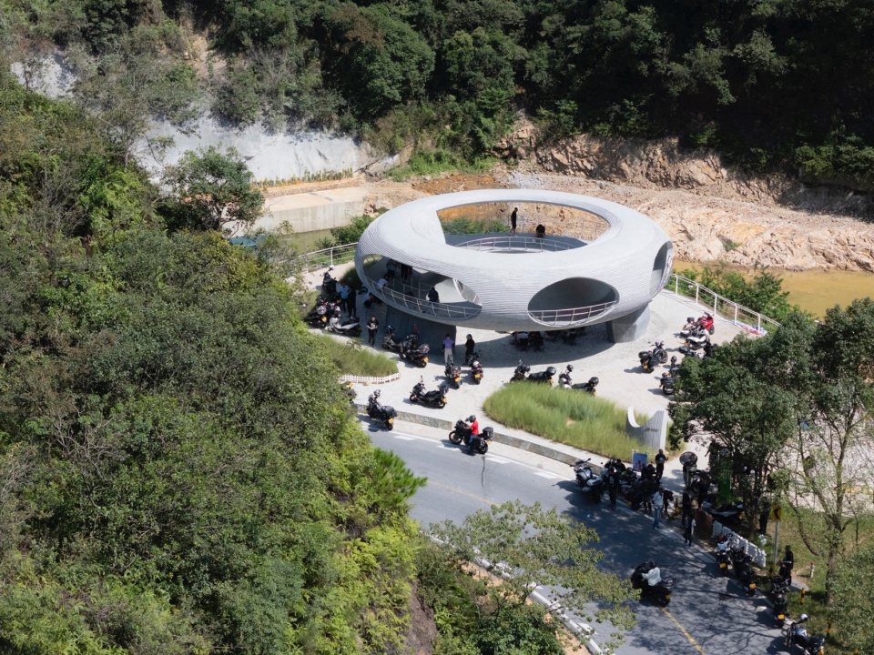 resting loop with views a creekside pavilion among hills by hcch studio