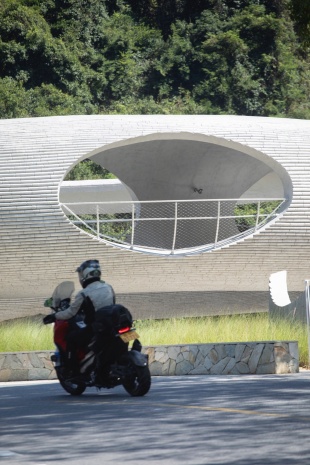 resting loop with views a creekside pavilion among hills by hcch studio