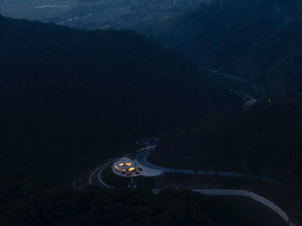 resting loop with views a creekside pavilion among hills by hcch studio