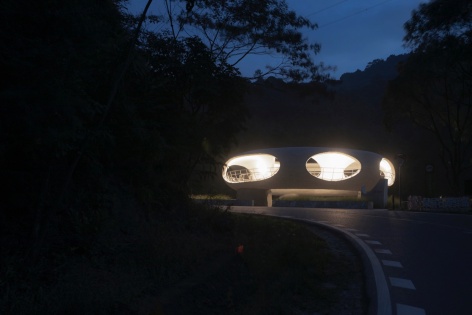 resting loop with views a creekside pavilion among hills by hcch studio