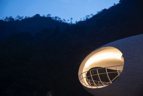 resting loop with views a creekside pavilion among hills by hcch studio