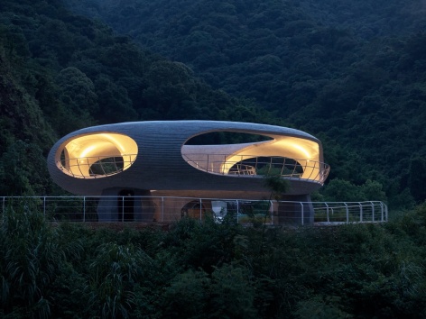 resting loop with views a creekside pavilion among hills by hcch studio