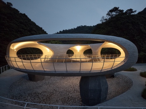 resting loop with views a creekside pavilion among hills by hcch studio