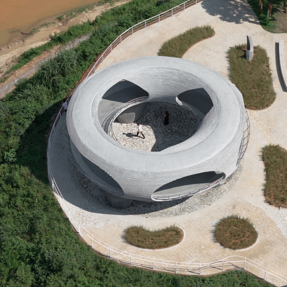 resting loop with views a creekside pavilion among hills by hcch studio