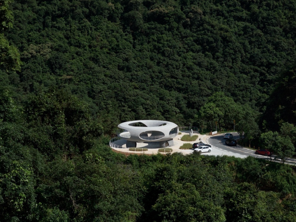 resting loop with views a creekside pavilion among hills by hcch studio