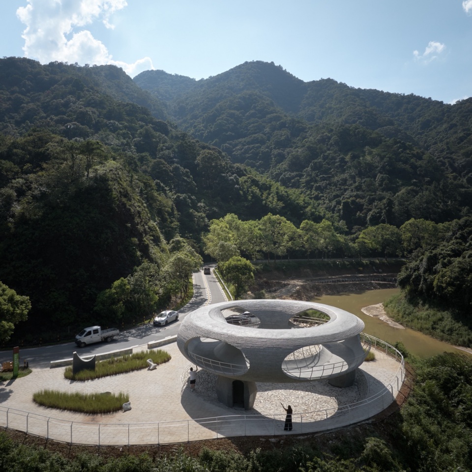 resting loop with views a creekside pavilion among hills by hcch studio