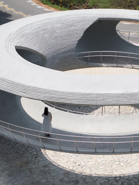resting loop with views a creekside pavilion among hills by hcch studio