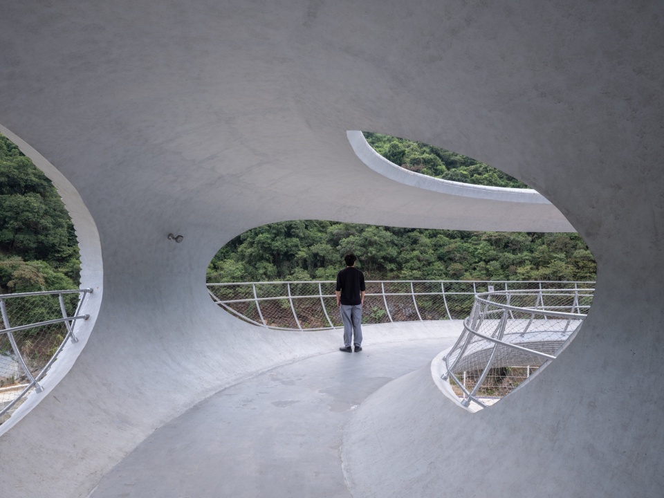 resting loop with views a creekside pavilion among hills by hcch studio