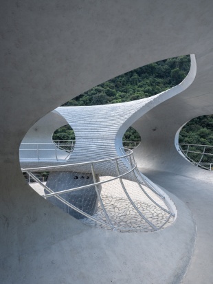 resting loop with views a creekside pavilion among hills by hcch studio