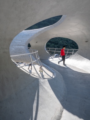 resting loop with views a creekside pavilion among hills by hcch studio