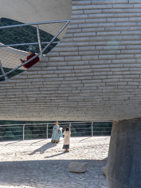 resting loop with views a creekside pavilion among hills by hcch studio