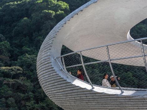resting loop with views a creekside pavilion among hills by hcch studio