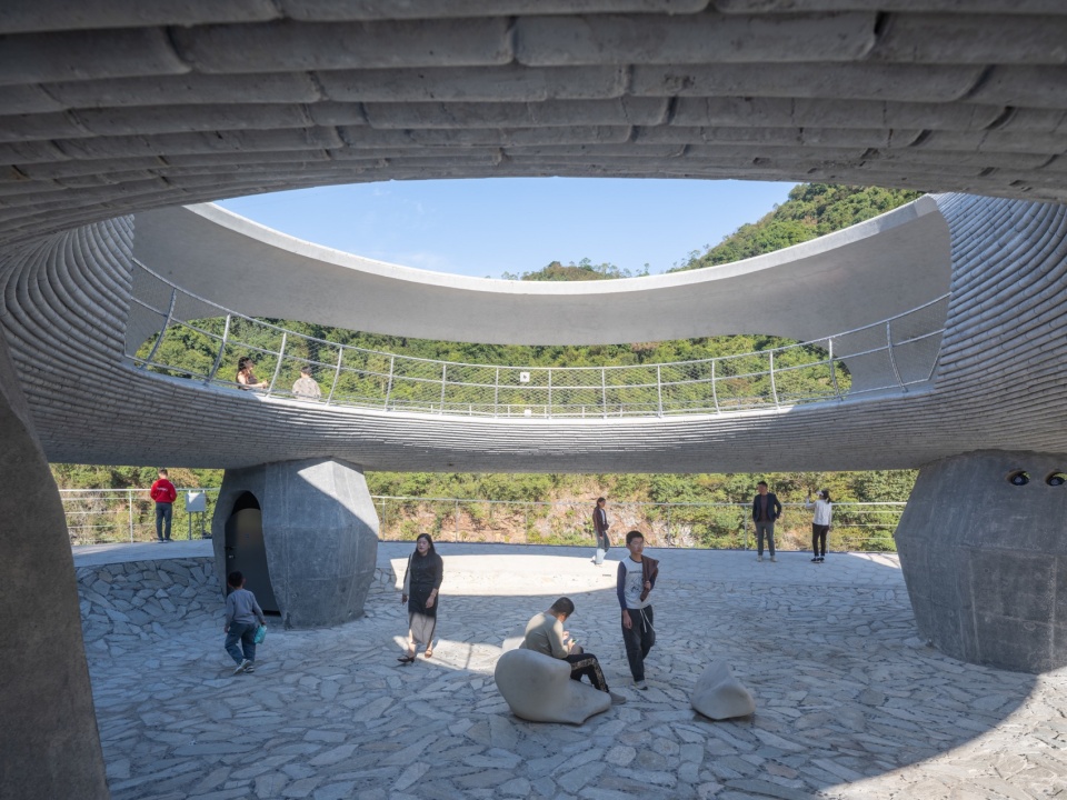 resting loop with views a creekside pavilion among hills by hcch studio
