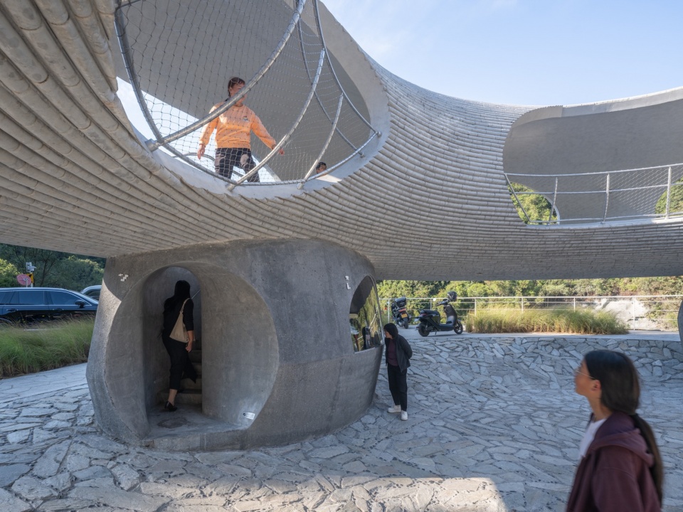 resting loop with views a creekside pavilion among hills by hcch studio
