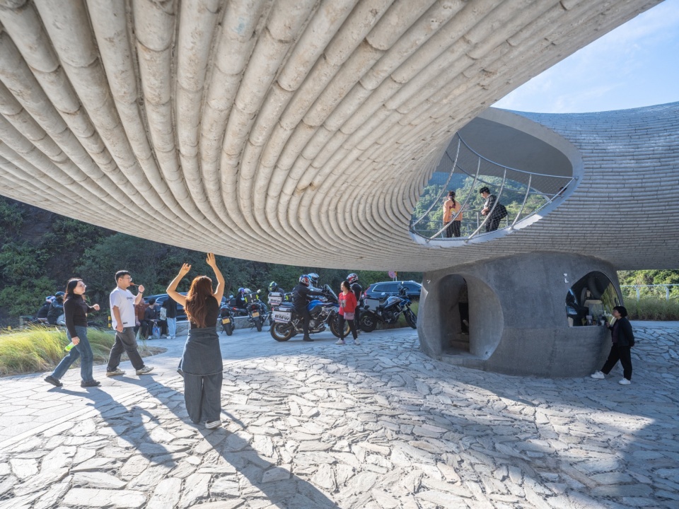 resting loop with views a creekside pavilion among hills by hcch studio