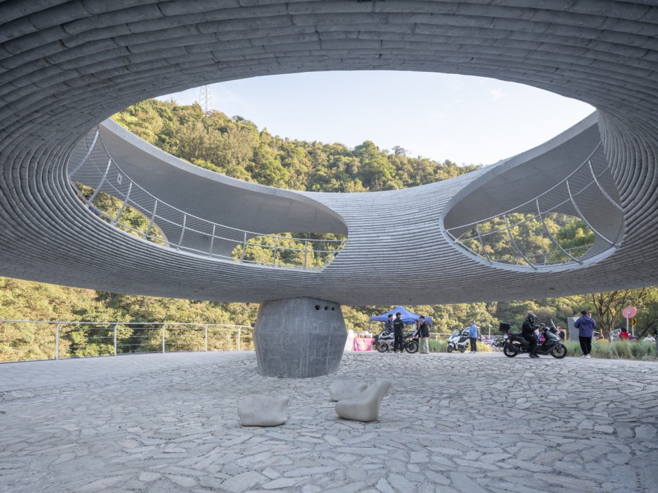resting loop with views a creekside pavilion among hills by hcch studio