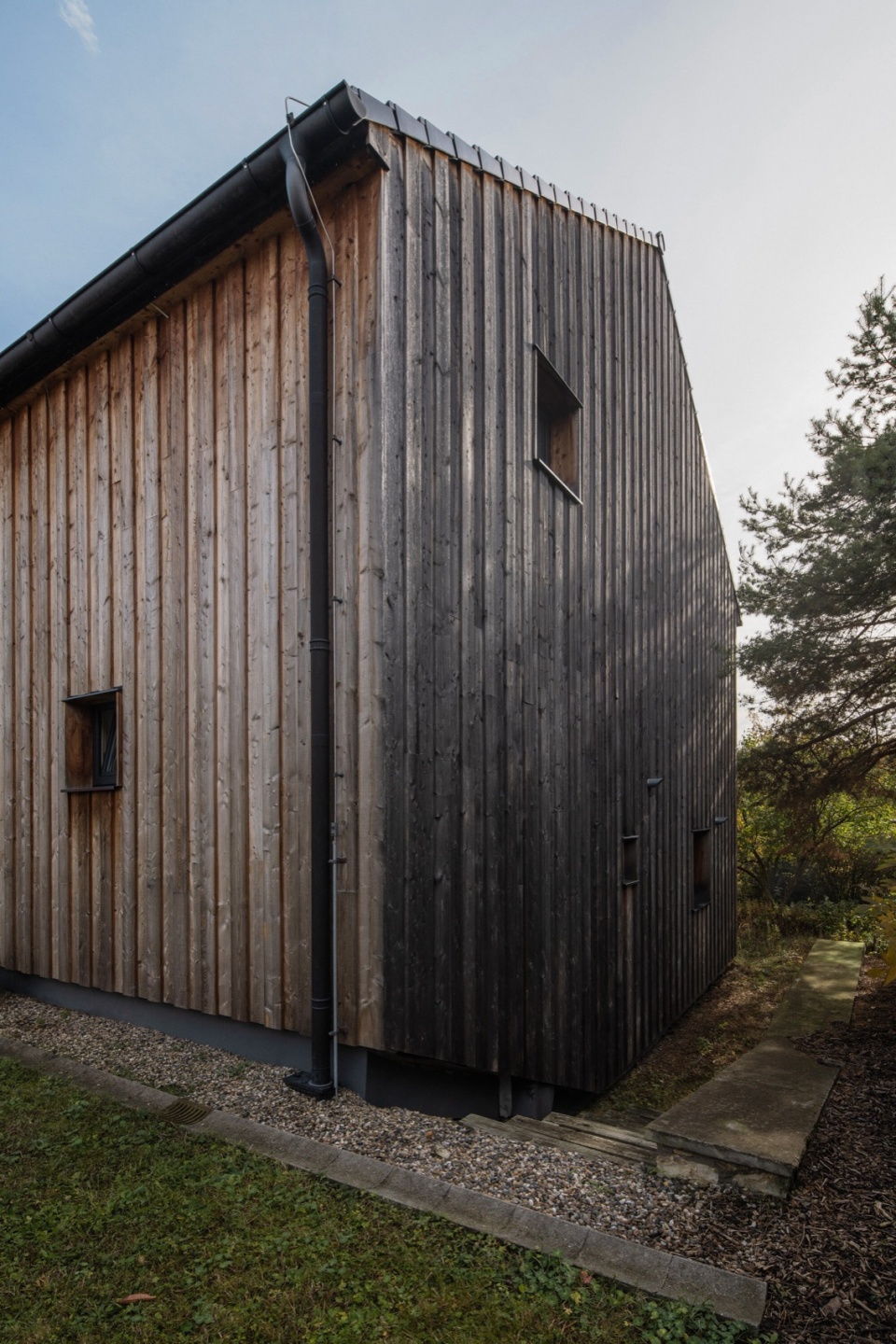 family house in mature garden by mimosa architects