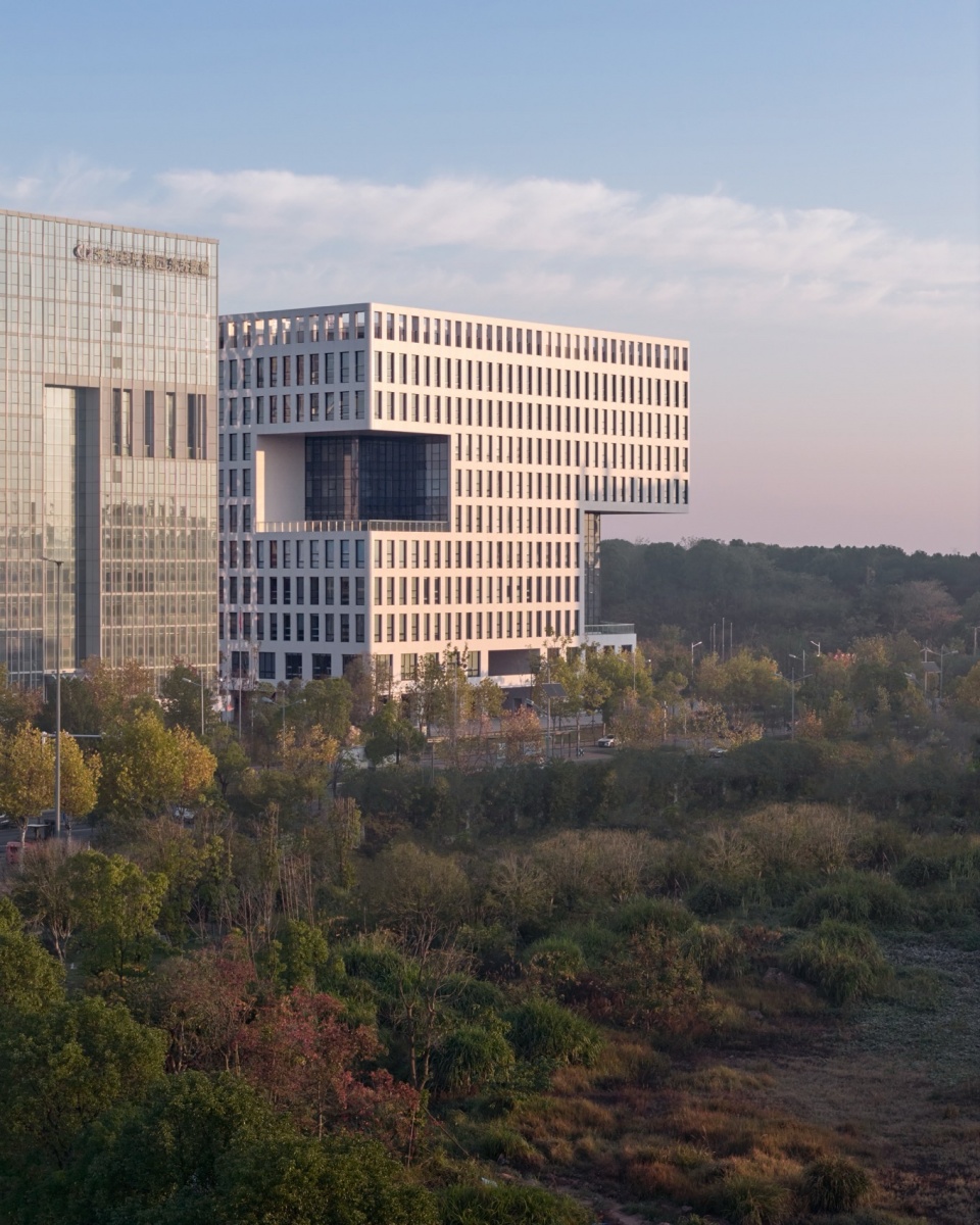 Xingsha Industrial Base Free Trade Headquarters Building by Leeko Architects