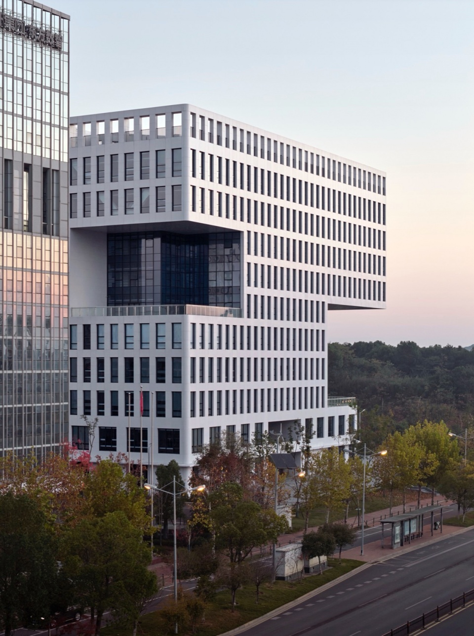 Xingsha Industrial Base Free Trade Headquarters Building by Leeko Architects