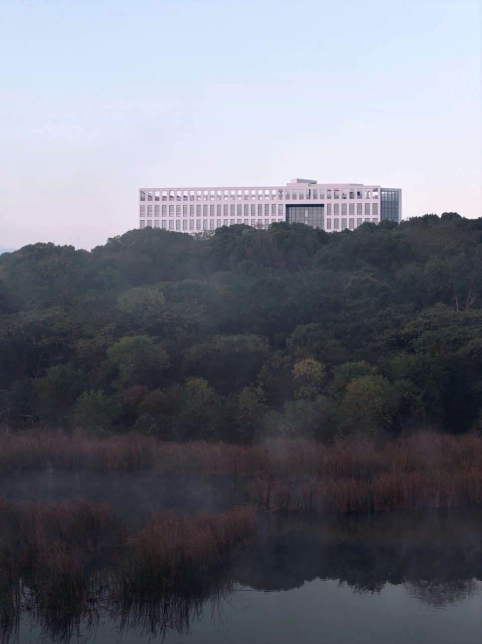 Xingsha Industrial Base Free Trade Headquarters Building by Leeko Architects