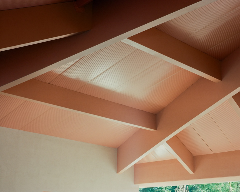 under the pink roof by caret studio
