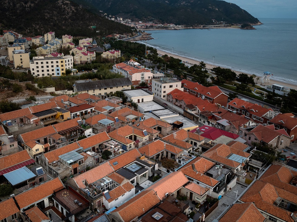 a collection of courtyard renovations in ximaiyao village by bu