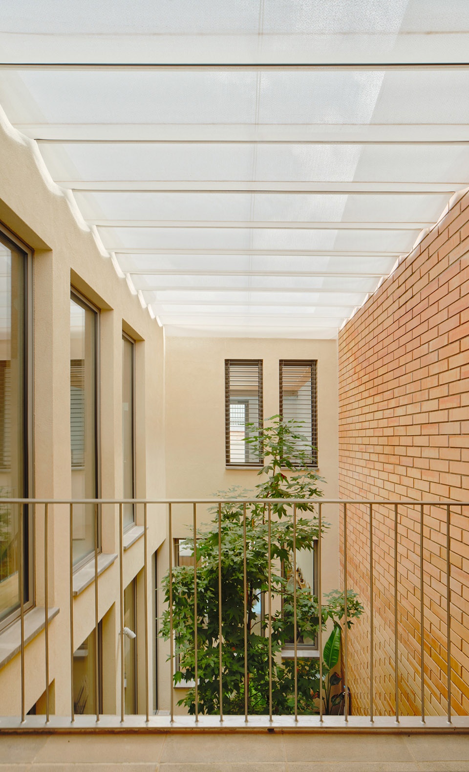 117bof a house to live around a tree by vallribera noray arquitectes