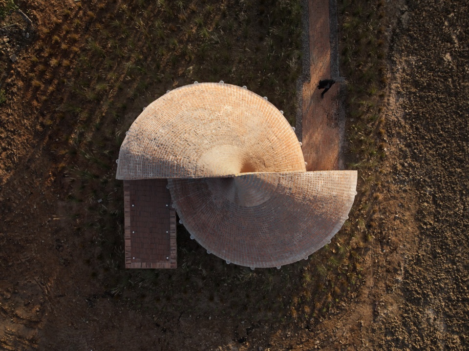 twisted brick shell concept library by hcch studio.htm