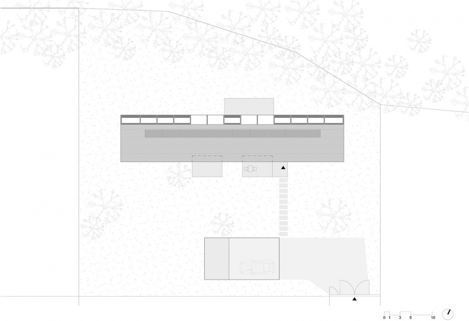 modular house with a sloping facade by papundekl architects