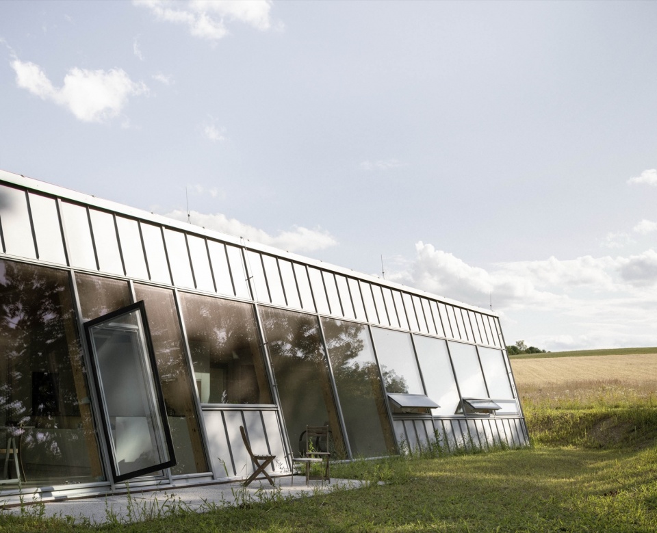 modular house with a sloping facade by papundekl architects