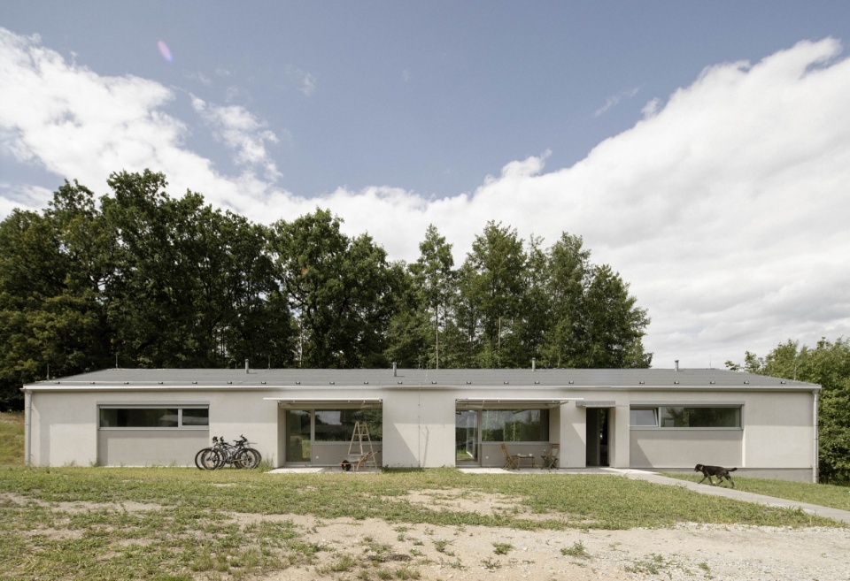 modular house with a sloping facade by papundekl architects