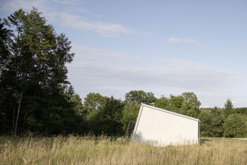 modular house with a sloping facade by papundekl architects