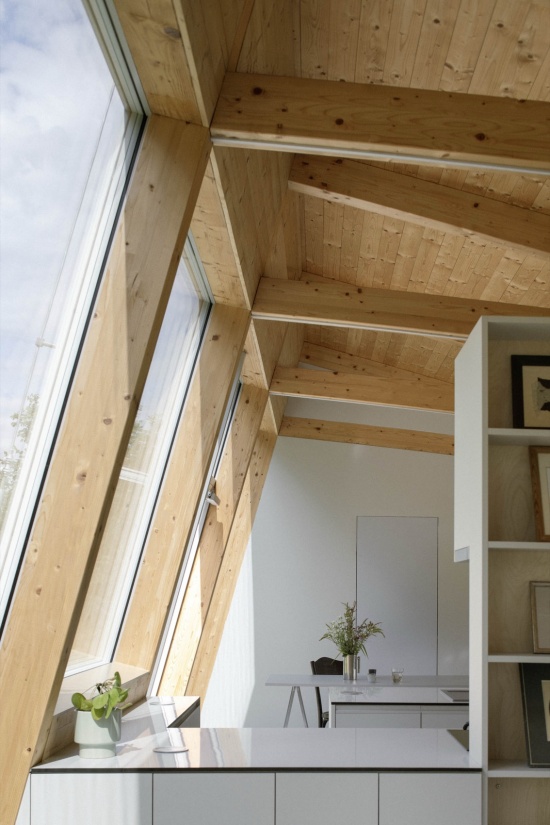 modular house with a sloping facade by papundekl architects