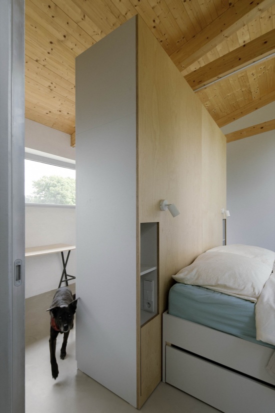 modular house with a sloping facade by papundekl architects