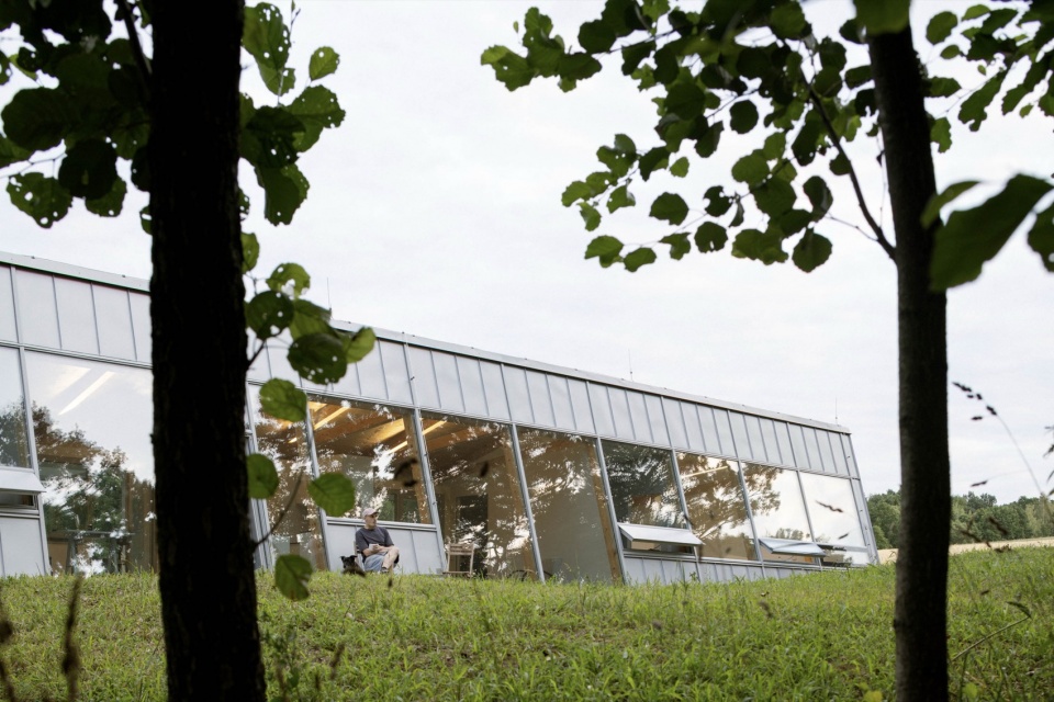 modular house with a sloping facade by papundekl architects