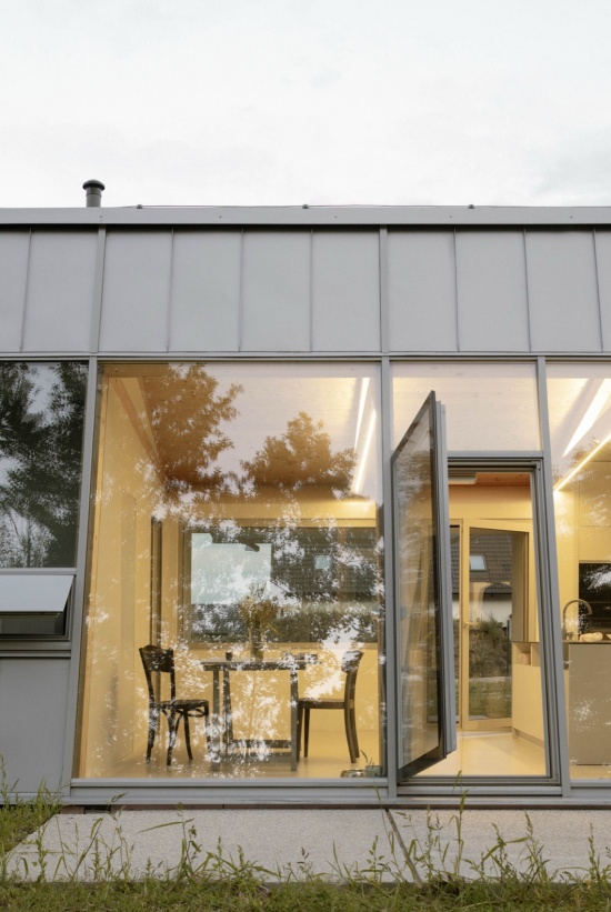 modular house with a sloping facade by papundekl architects