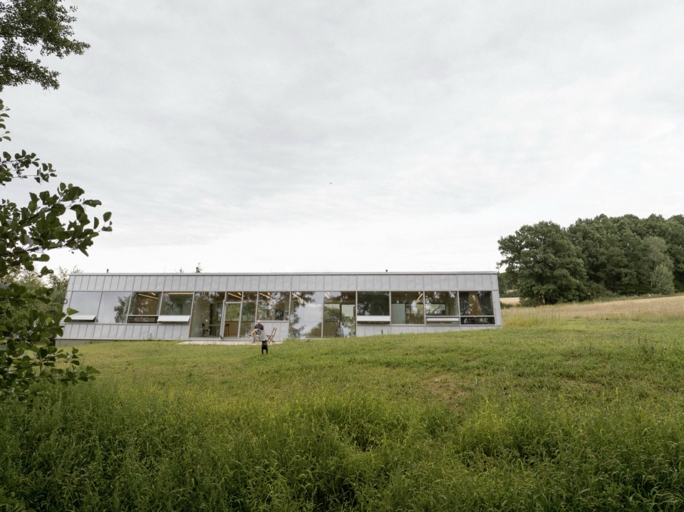 modular house with a sloping facade by papundekl architects